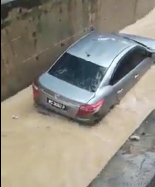 Car gets washed away in monsoon drain