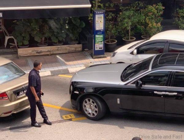 Bodyguard ‘Chops’ Parking for Rolls-Royce Owner